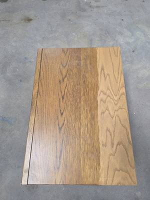 Stripping furniture using a laser