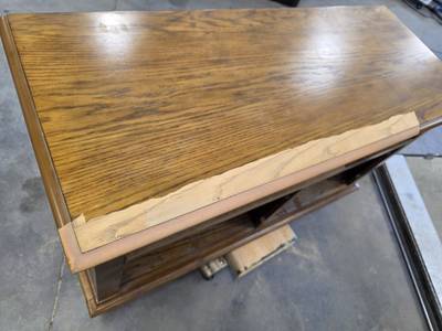 Laser finish removal on furniture